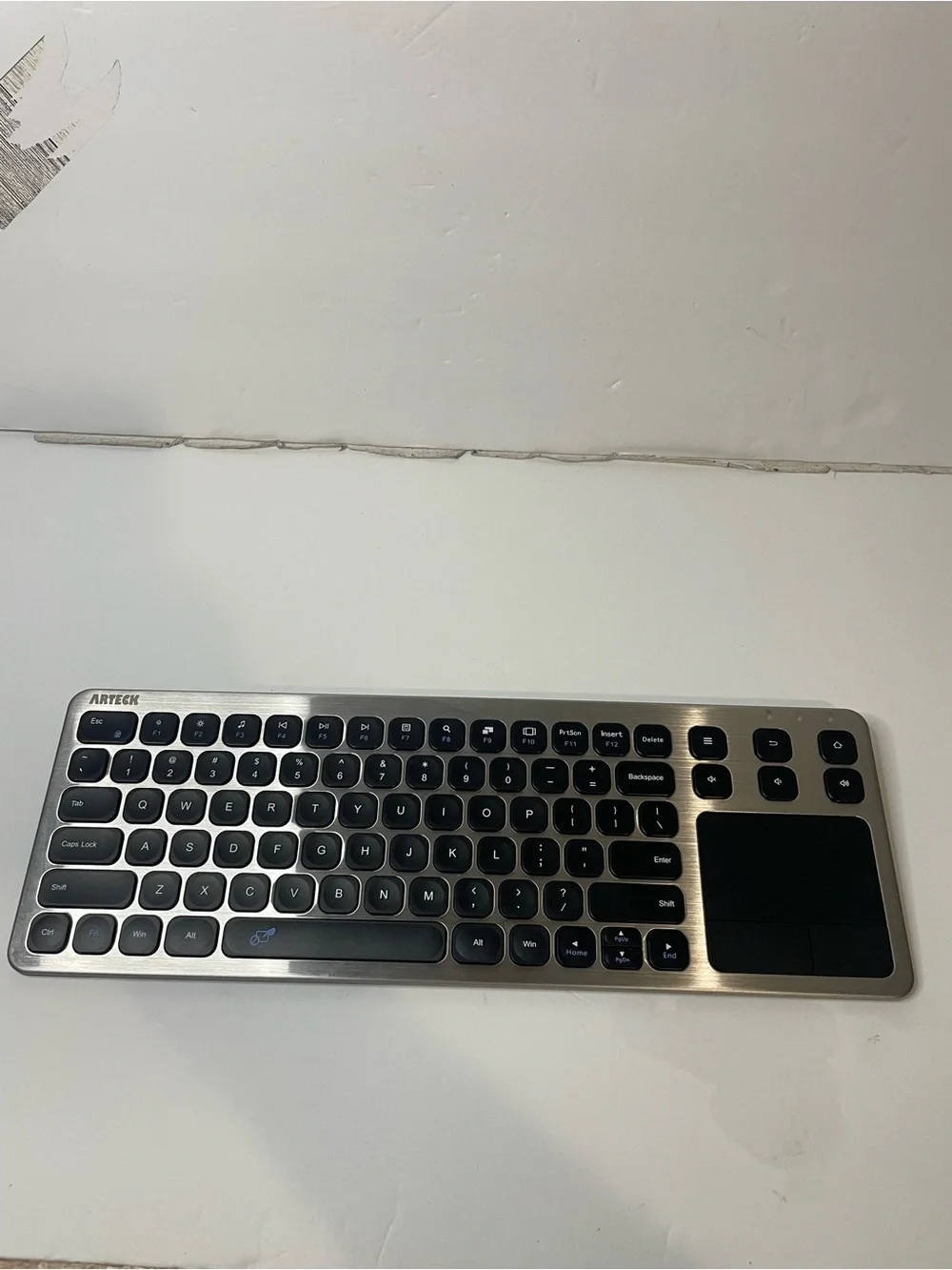 Arteck Wireless Slim Keyboard with Touchpad - Silver and Black